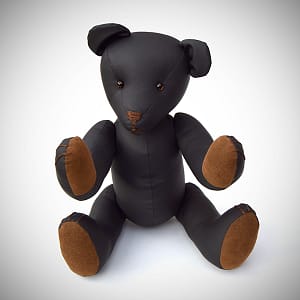 Kinky Teddy Bear made from Sheets of San Francisco Black fluidproof fabric. Seated position with brown paws.